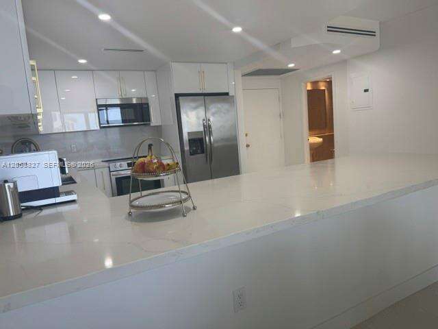 The Carriage House at 5401 Collins Ave, Miami Beach, FL 33140 - For Rent photo 21